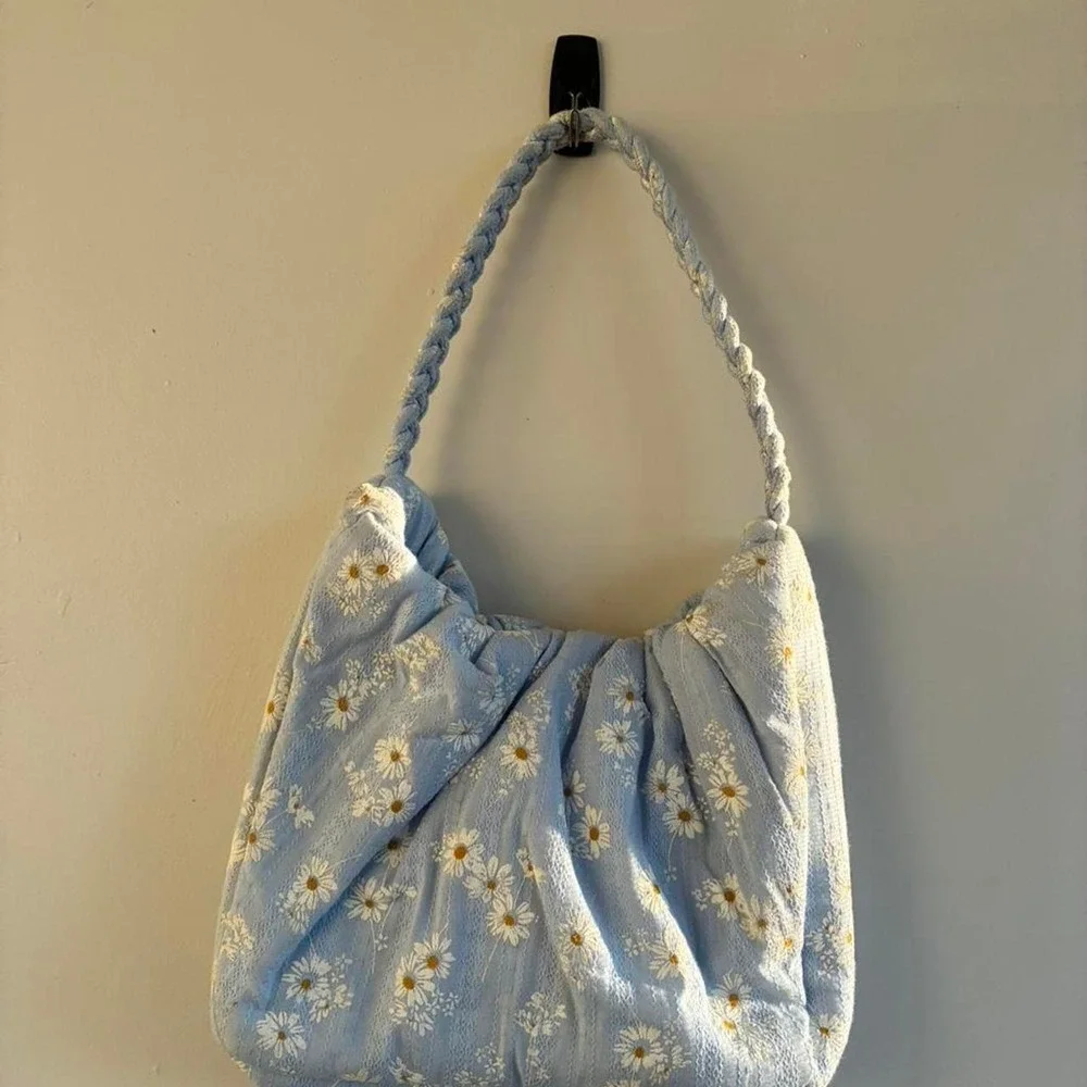 Blue floral fabric bag with rope handles and magnetic clasps | Coquette